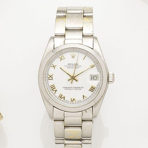 Rolex. A mid-size 18K white gold automatic calendar bracelet watch with later plated steel bracelet