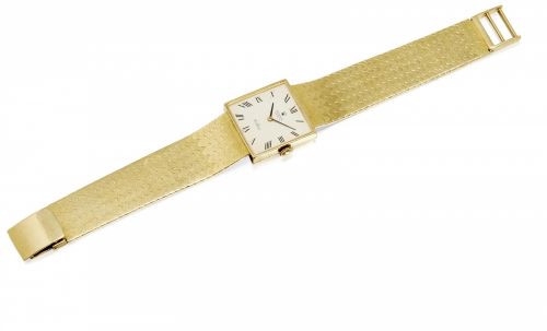 Rolex. An 18K gold bracelet watch