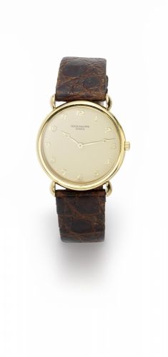 Patek Philippe. An 18K gold manual wind wristwatch
