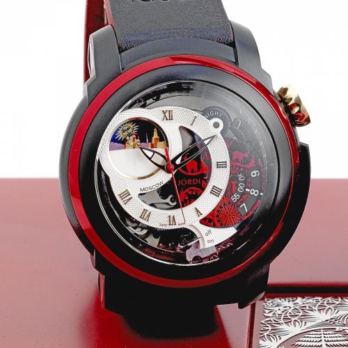 Michel Jordi. A titanium manual wind alarm wristwatch with day/night indication
