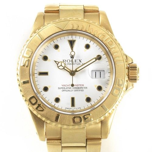 Rolex. An 18K gold automatic calendar bracelet watch