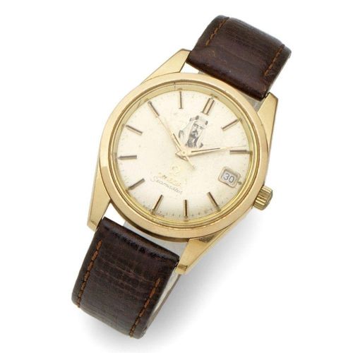 Omega. An 18K gold automatic calendar wristwatch