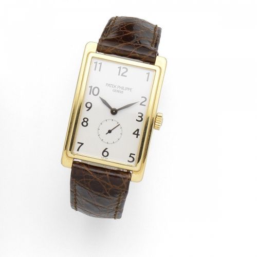 Patek Philippe. An 18K gold manual wind wristwatch