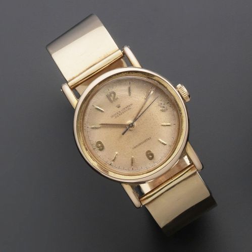 Rolex. An 18K rose gold automatic bubble back bracelet watch