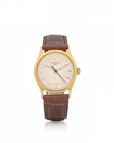 Patek Philippe. An 18K yellow gold manual wind Wristwatch