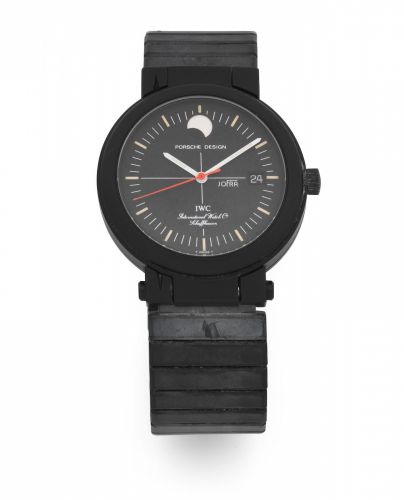IWC with Porsche Design. A black DLC coated aluminium automatic calendar bracelet watch with moon phase and concealed compass