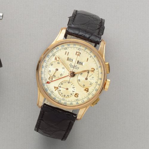 Breitling. An 18K gold manual wind triple calendar chronograph wristwatch