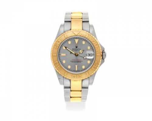 Rolex. A stainless steel and gold automatic calendar bracelet watch