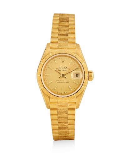 Rolex. A lady's fine 18K gold automatic wristwatch with date