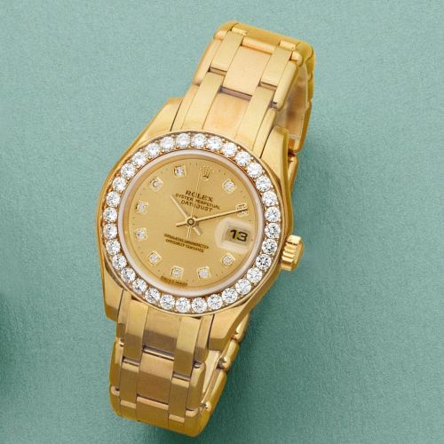 Rolex. A lady's 18K gold and diamond set automatic calendar bracelet watch