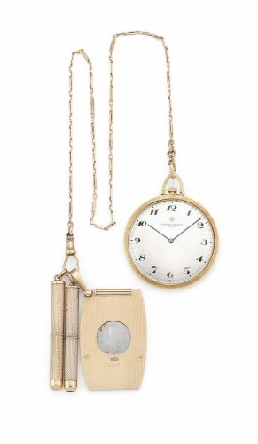 Vacheron & Constantin. A slim 18K gold keyless wind open face pocket watch