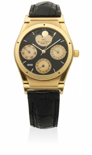 IWC. An 18K gold automatic perpetual calendar wristwatch with moon phase