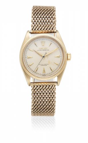 Rolex. A 9K gold automatic bracelet watch