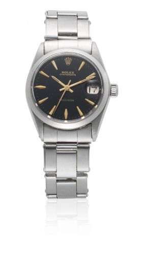 Rolex. A mid-size stainless steel manual wind calendar bracelet watch