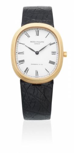 Patek Philippe. An 18K gold manual wind wristwatch Retailed by Tiffany & Co