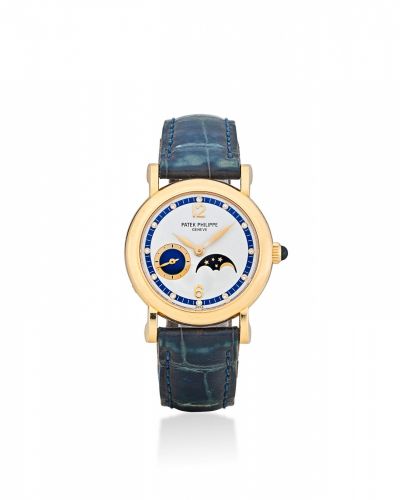 Patek Philippe. A fine 18K gold lady's diamond-set watch with moon phase