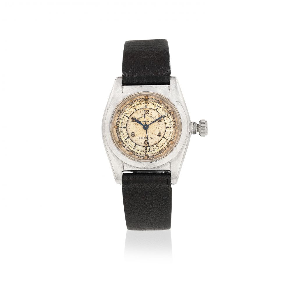 Rolex. A stainless steel manual wind wristwatch