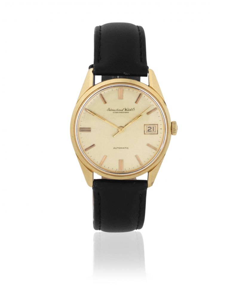 International Watch Company. An 18K gold automatic calendar wristwatch