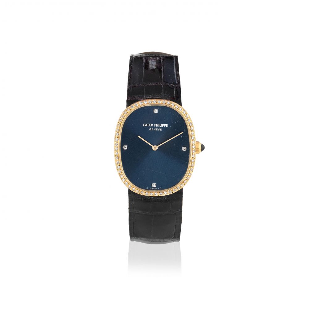 Patek Philippe. An 18K gold and diamond set manual wind wristwatch