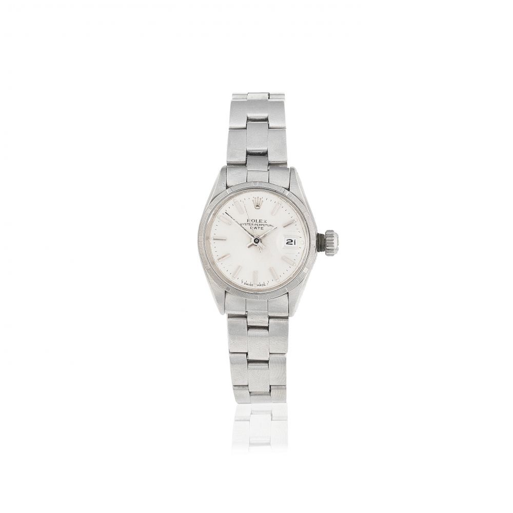 Rolex. A lady's stainless steel automatic calendar bracelet watch