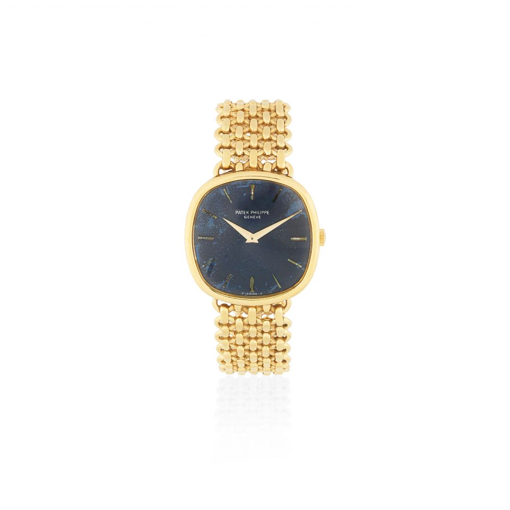 Patek Philippe. An 18K gold manual wind cushion form bracelet watch