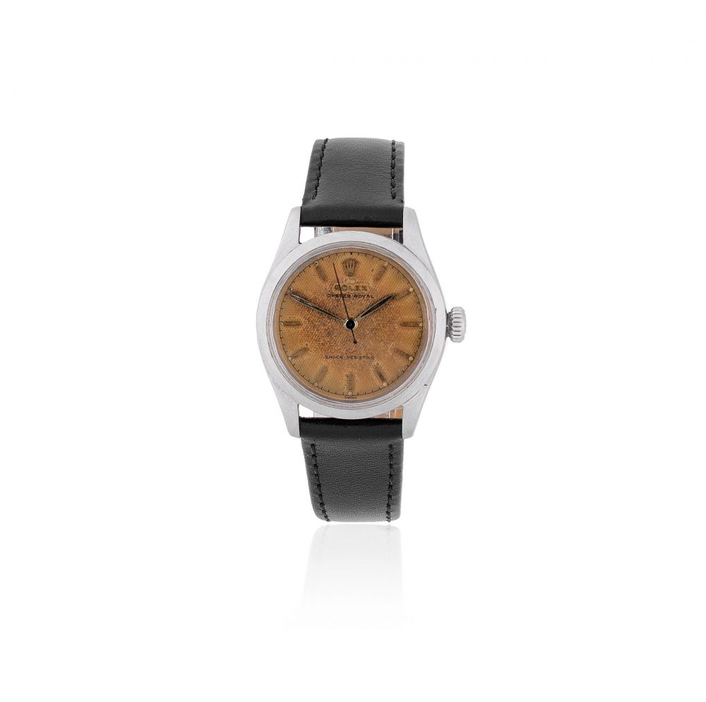 Rolex. A stainless steel manual wind wristwatch