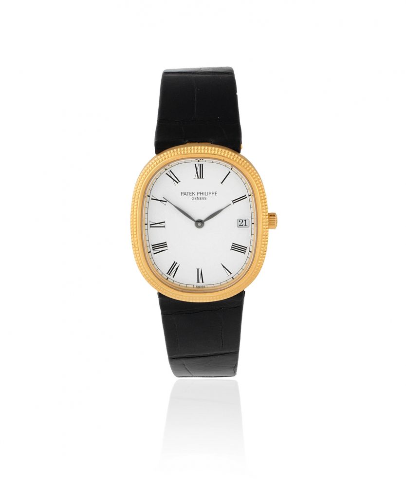Patek Philippe. A recently serviced 18K gold quartz calendar wristwatch