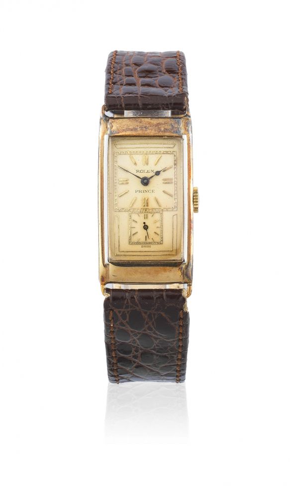 Rolex. A fine 18K gold manual wind rectangular wristwatch