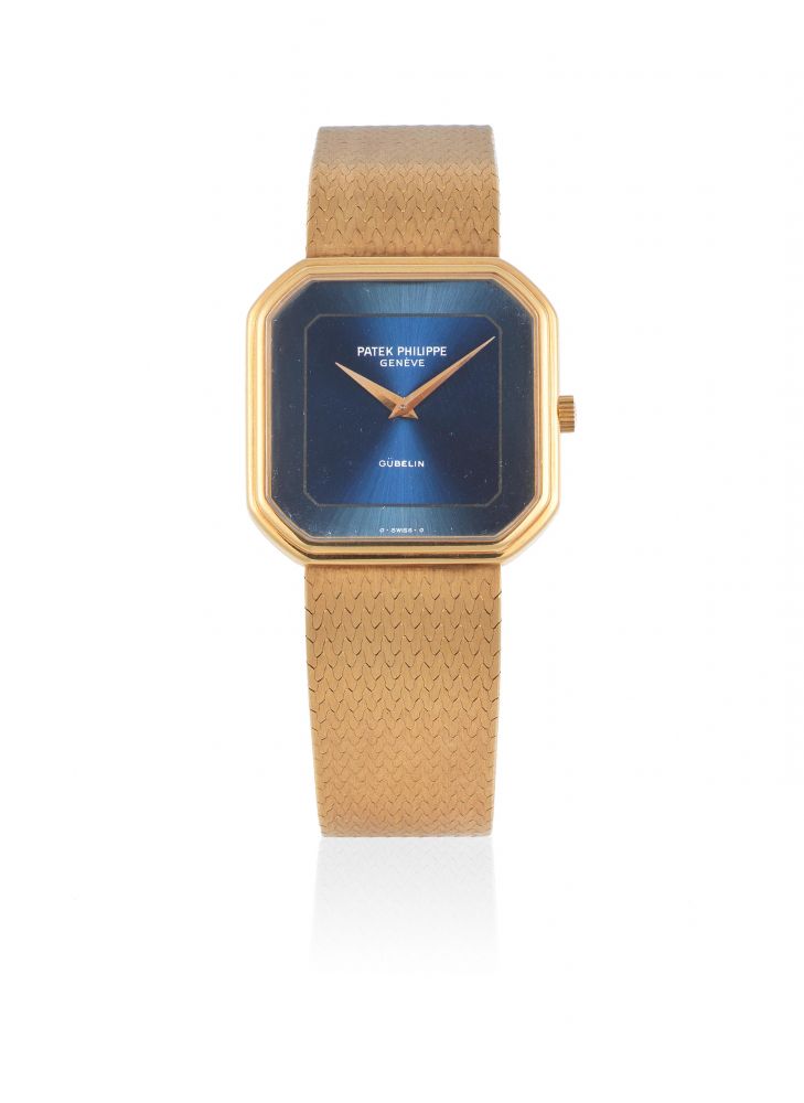 Patek Philippe. An 18K gold manual wind octagonal bracelet watch retailed by Gübelin