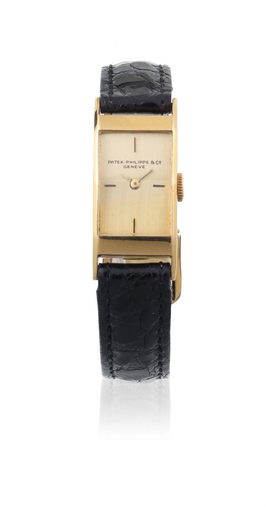 Patek Philippe & Co, Geneve. A lady's 18K gold manual wind rectangular wristwatch