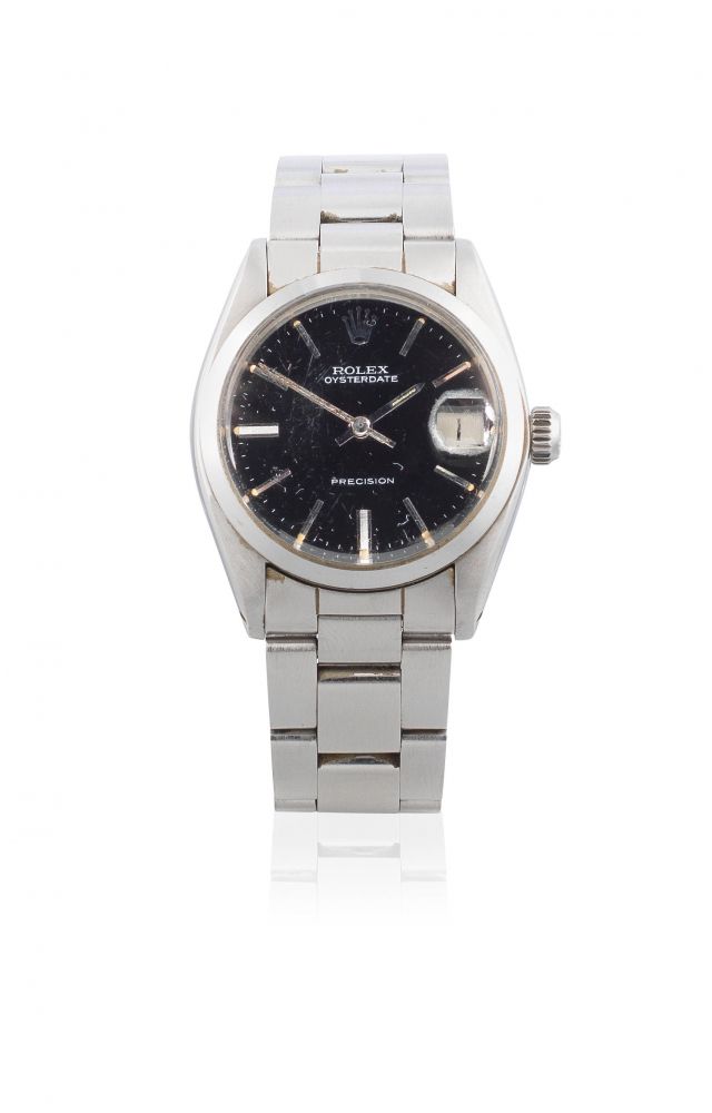 Rolex. A mid-size stainless steel manual wind calendar bracelet watch with centre seconds