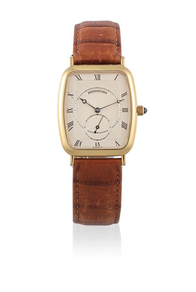 Breguet. An 18K gold manual wind rectangular form wristwatch