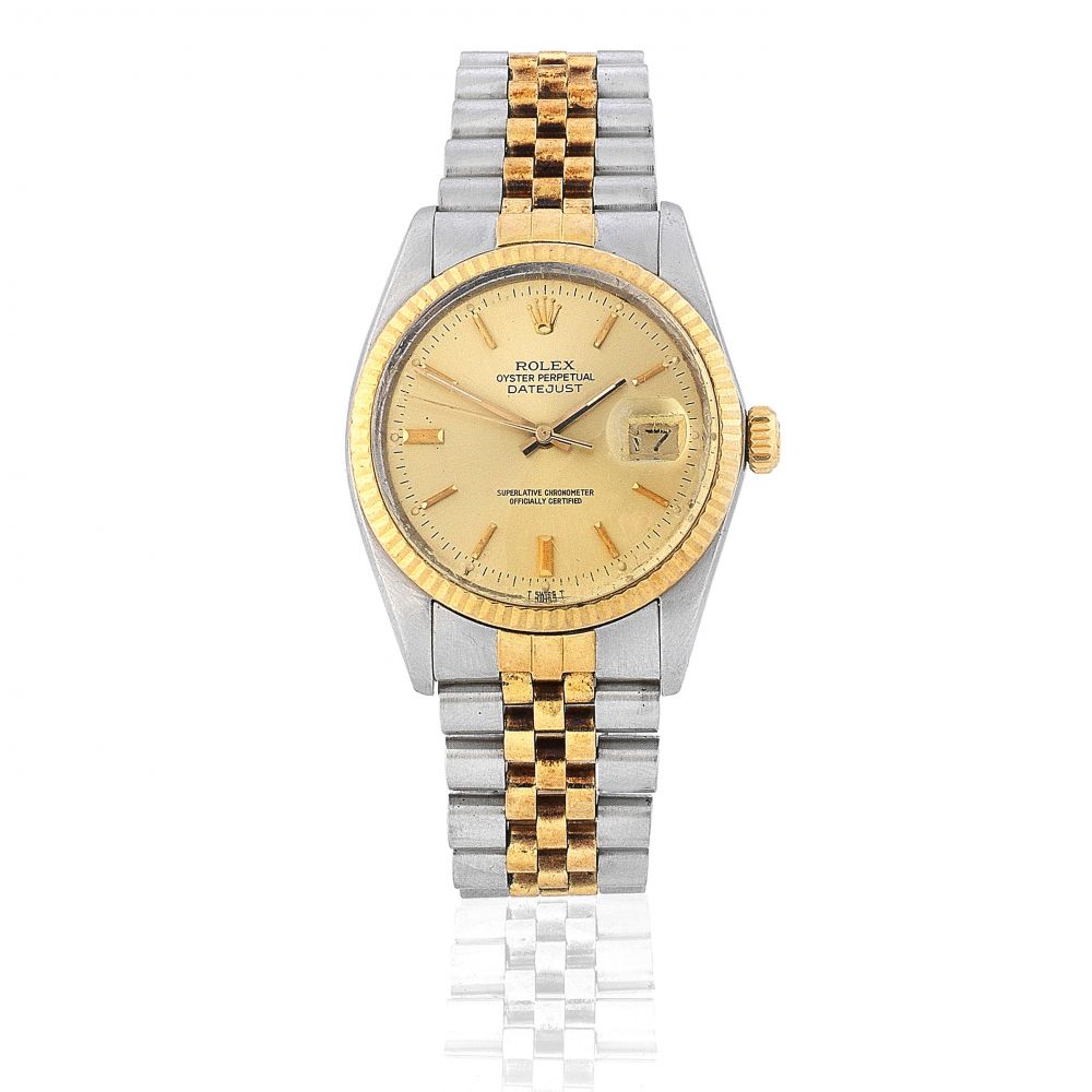 Rolex. A stainless steel and gold automatic calendar bracelet watch