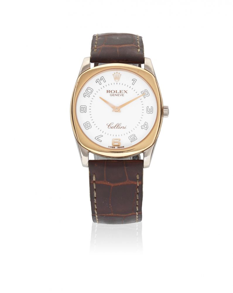 Rolex. An 18K white and yellow gold manual wind wristwatch