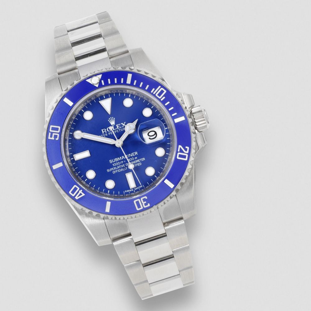 Rolex. A fine 18K white gold automatic calendar bracelet watch