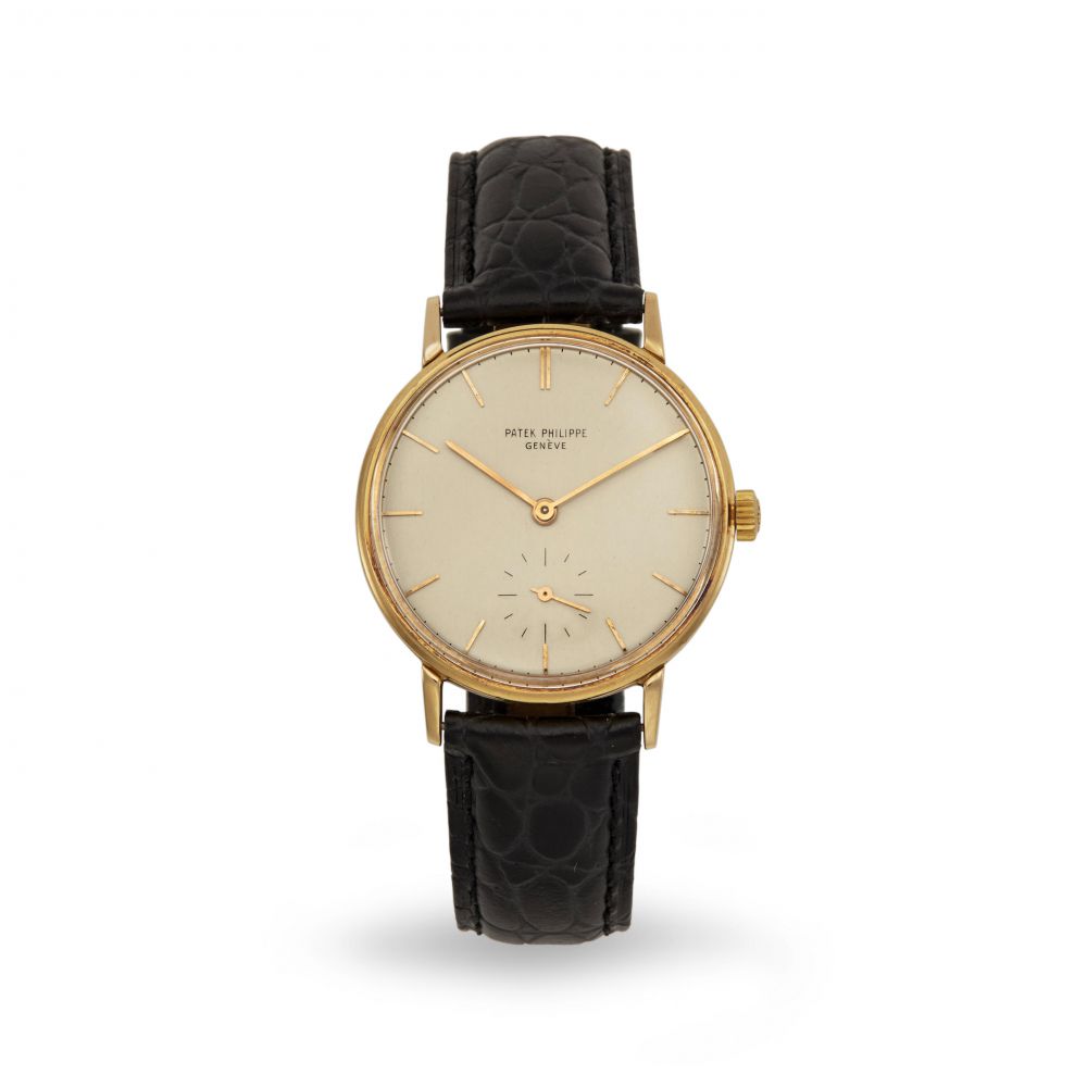 PATEK PHILIPPE. AN 18K GOLD MANUAL WIND WRISTWATCH