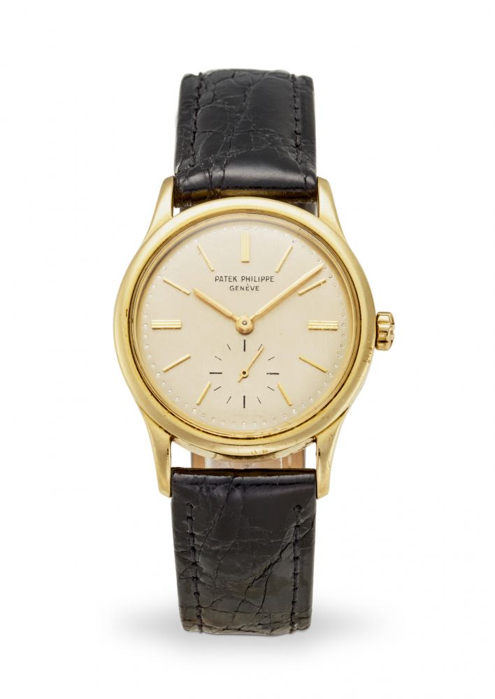 PATEK PHILIPPE. AN 18K GOLD AUTOMATIC WRISTWATCH