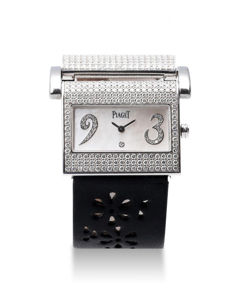 PIAGET | MISS PROTOCOLE XL, A FINE WHITE GOLD AND DIAMOND-SET WRISTWATCH WITH MOTHER-OF-PEARL DIAL, CIRCA 2005