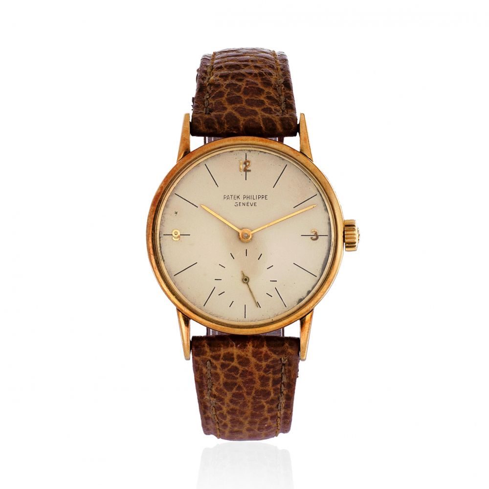Patek Philippe. An 18K gold manual wind wristwatch