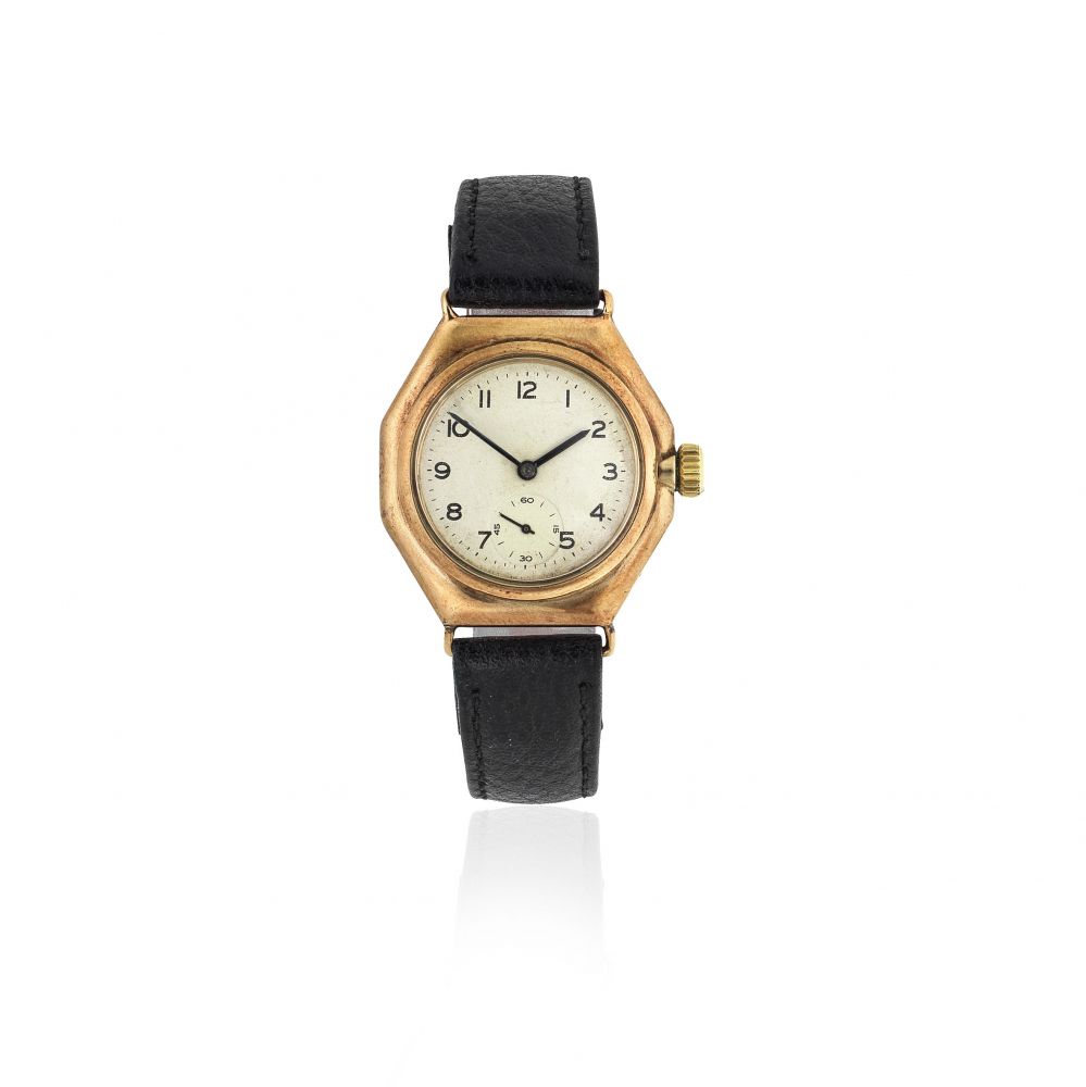 Rolex. A 9K gold manual wind octagonal wristwatch