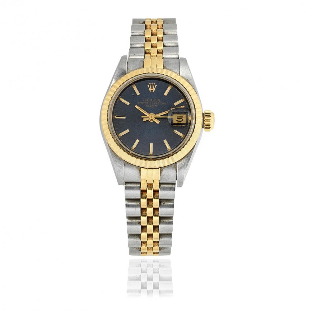Rolex. A lady's 18K gold and stainless steel automatic calendar bracelet watch