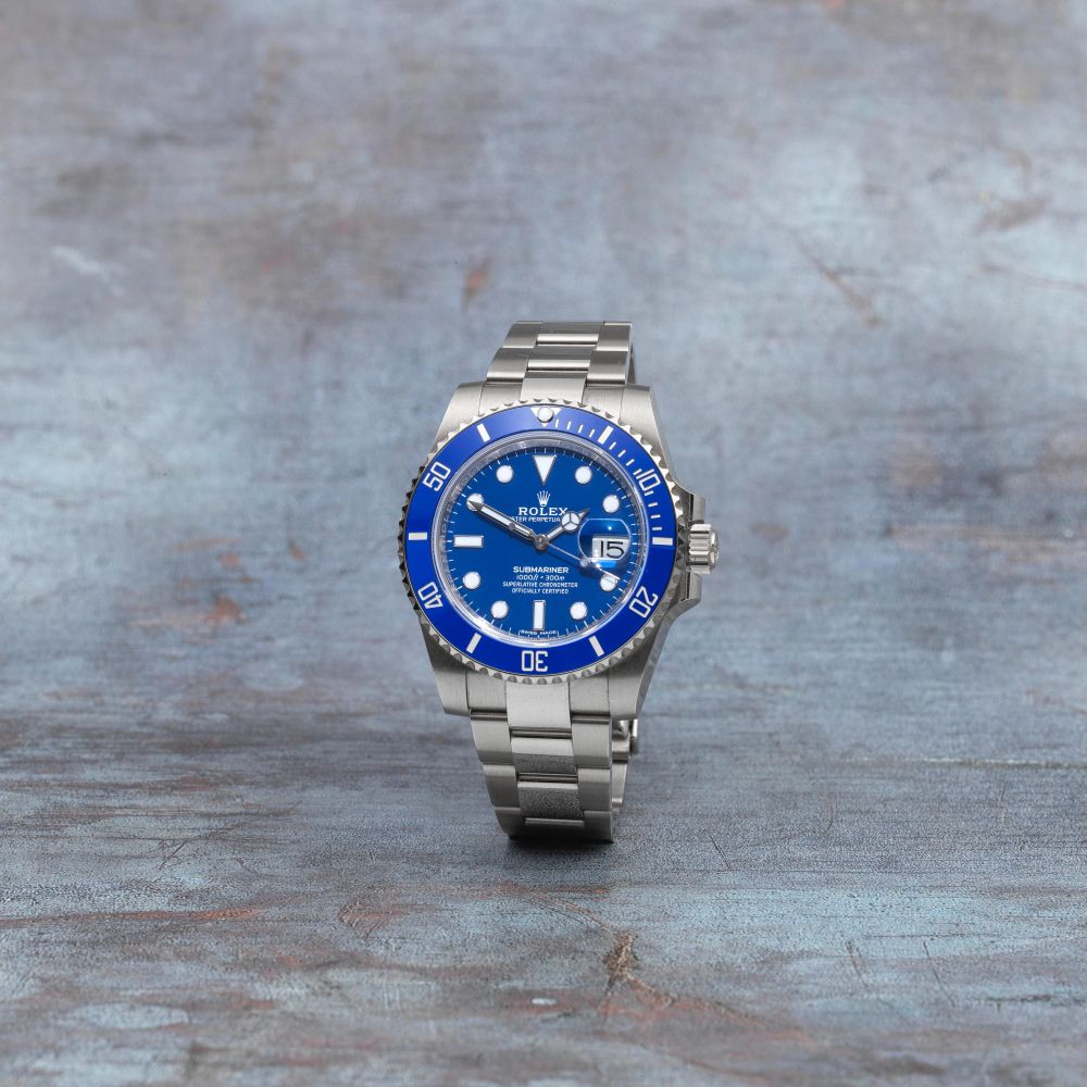 Rolex. A fine 18K white gold automatic calendar bracelet watch