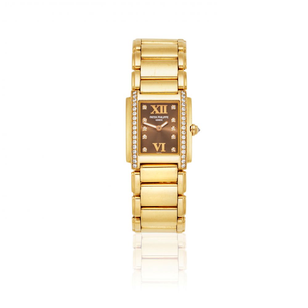 PATEK PHILIPPE. A LADY'S 18K ROSE GOLD BRACELET WATCH