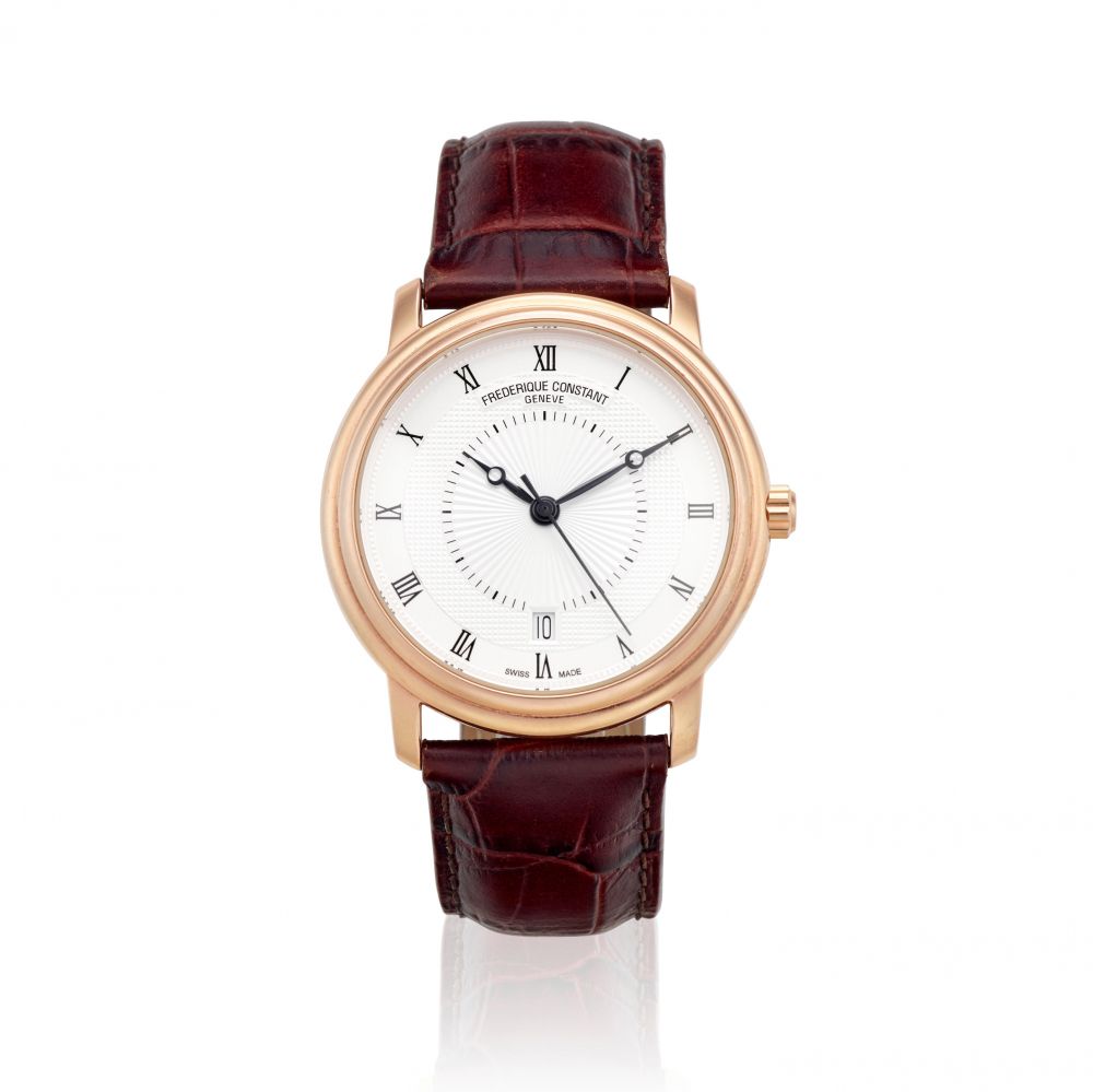 FREDERIQUE CONSTANT. AN 18K GOLD AUTOMATIC CALENDAR WATCH