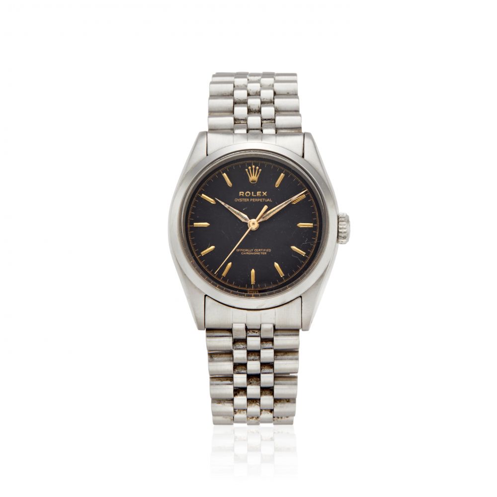 ROLEX. A STAINLESS STEEL AUTOMATIC BRACELET WATCH