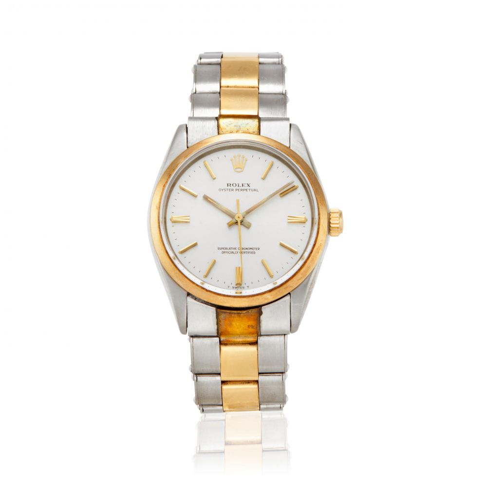 ROLEX. A GOLD AND STAINLESS STEEL AUTOMATIC BRACELET WATCH