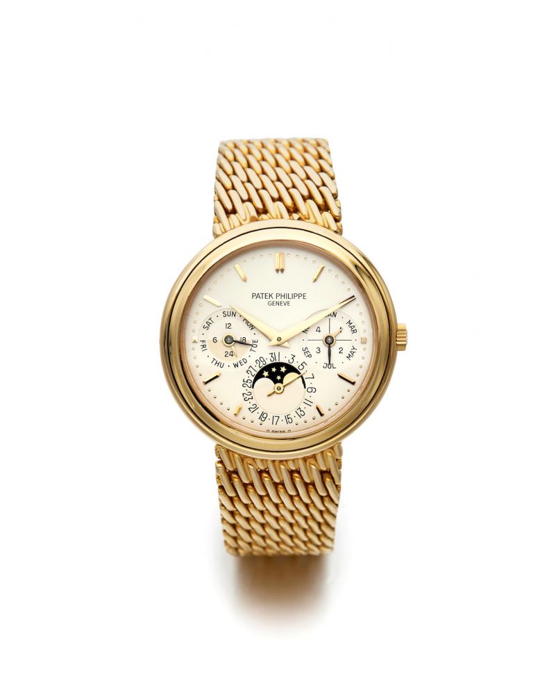 PATEK PHILIPPE | REF. 3945/001, A RARE YELLOW GOLD PERPETUAL CALENDAR BRACELET WATCH WITH MOON PHASES, 1991