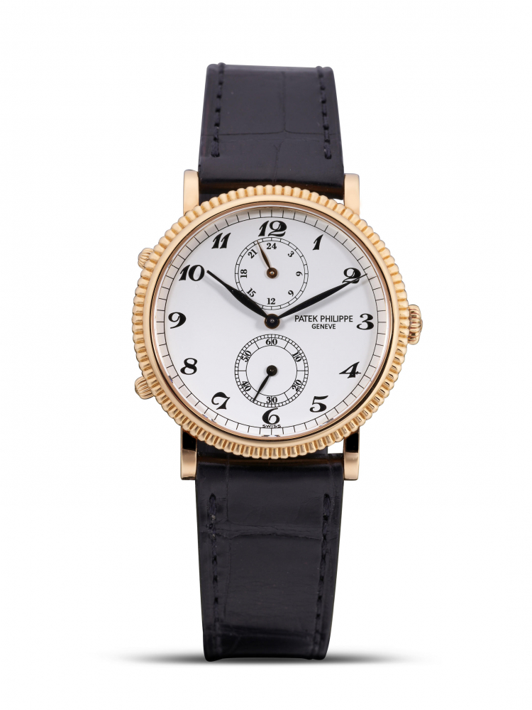 PATEK PHILIPPE | CALATRAVA TRAVEL TIME, REF.5034, A FINE YELLOW GOLD DUAL TIME WRISTWATCH, CIRCA 2001