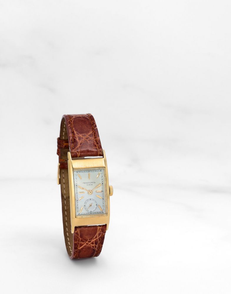 PATEK PHILIPPE. MONTRE BRACELET EN OR JAUNE 18K (750) DE FORME RECTANGULAIRE MOUVEMENT MECANIQUE