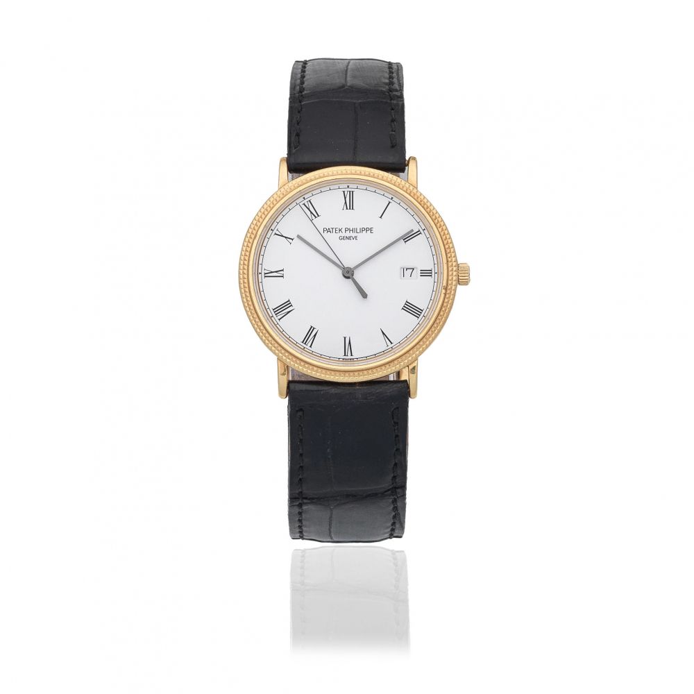 Patek Philippe. An 18K gold quartz calendar wristwatch